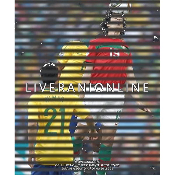 (100625) -- DURBAN, June 25, 2010 -- Tiago (C) of Portugal heads the ball during the Group G last round match against Brazil at 2010 FIFA World Cup, at Moses Mabhida stadium in Durban, South Africa, on June 25, 2010. Liao Yujie) (dl) MONDIALI DI CALCIO SUDAFRICA 2010 PORTOGALLO BRASILE CALCIO SPORT ©PHOTOSHOT/ALDO LIVERANI ITALY ONLY