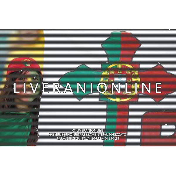 (100625) -- DURBAN, June 25, 2010 -- A fan of Portugal cheers prior to the Group G last round match between Portugal and Brazil at 2010 FIFA World Cup, at Moses Mabhida stadium in Durban, South Africa, on June 25, 2010. Liao Yujie) (dl) MONDIALI DI CALCIO SUDAFRICA 2010 PORTOGALLO BRASILE CALCIO SPORT ©PHOTOSHOT/ALDO LIVERANI ITALY ONLY