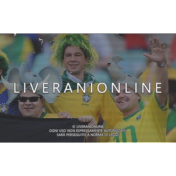 (100625) -- DURBAN, June 25, 2010 -- Fans of Brazil cheer prior to the Group G last round match between Portugal and Brazil at 2010 FIFA World Cup, at Moses Mabhida stadium in Durban, South Africa, on June 25, 2010. Chen Haitong)(dl) MONDIALI DI CALCIO SUDAFRICA 2010 PORTOGALLO BRASILE CALCIO SPORT ©PHOTOSHOT/ALDO LIVERANI ITALY ONLY