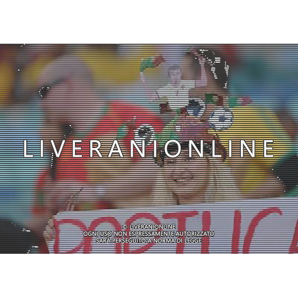 (100625) -- DURBAN, June 25, 2010 -- A fan of Portugal cheers prior to the Group G last round match between Portugal and Brazil at 2010 FIFA World Cup, at Moses Mabhida stadium in Durban, South Africa, on June 25, 2010. Chen Haitong) (dl) MONDIALI DI CALCIO SUDAFRICA 2010 PORTOGALLO BRASILE CALCIO SPORT ©PHOTOSHOT/ALDO LIVERANI ITALY ONLY