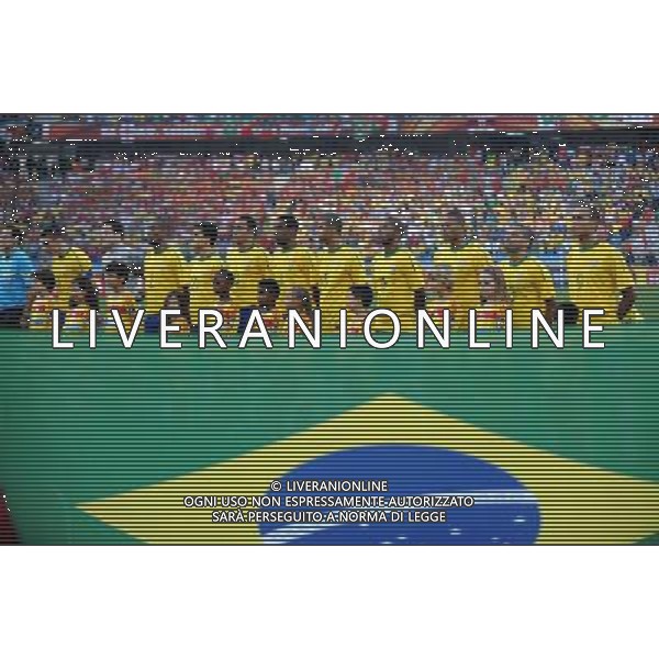 (100626) -- DURBAN, June 26, 2010 -- Brazil\'s players sing national anthem prior to the Group G last round match against Portugal at 2010 FIFA World Cup, at Moses Mabhida stadium in Durban, South Africa, on June 25, 2010. The match tied 0-0. Both Brazil and Portugal are qualified for the round of 16. Chen Haitong) (dl) MONDIALI DI CALCIO SUDAFRICA 2010 PORTOGALLO BRASILE CALCIO SPORT ©PHOTOSHOT/ALDO LIVERANI ITALY ONLY