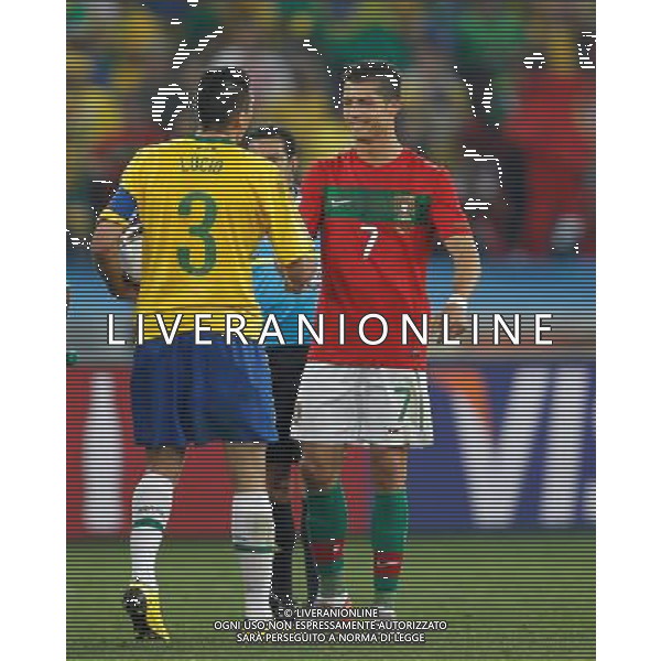 (100626) -- DURBAN, June 26, 2010 -- Brazil\'s Lucio (L) shakes hands with Cristiano Ronaldo of Portugal after the Group G last round match at 2010 FIFA World Cup, at Moses Mabhida stadium in Durban, South Africa, on June 25, 2010. The match tied 0-0. Both Brazil and Portugal are qualified for the round of 16. Liao Yujie) (dl) MONDIALI DI CALCIO SUDAFRICA 2010 PORTOGALLO BRASILE CALCIO SPORT ©PHOTOSHOT/ALDO LIVERANI ITALY ONLY