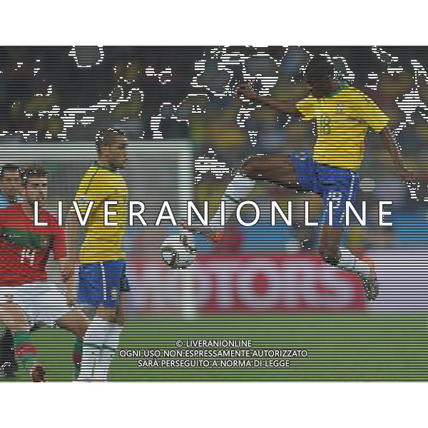 (100626) -- DURBAN, June 26, 2010 -- Brazil\'s Ramires (1st R) and Dani Alves (2nd R) competes during the Group G last round match with Portugal at 2010 FIFA World Cup, at Moses Mabhida stadium in Durban, South Africa, on June 25, 2010. The match tied 0-0. Both Brazil and Portugal are qualified for the round of 16. Chen Haitong) (dl) MONDIALI DI CALCIO SUDAFRICA 2010 PORTOGALLO BRASILE CALCIO SPORT ©PHOTOSHOT/ALDO LIVERANI ITALY ONLY