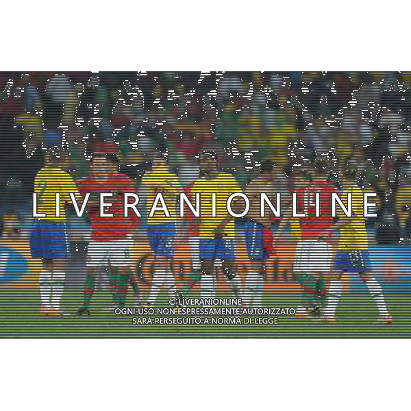 (100626) -- DURBAN, June 26, 2010 -- Players of Brazil and Portugal greet to each other after the Group G last round match against Portugal at 2010 FIFA World Cup, at Moses Mabhida stadium in Durban, South Africa, on June 25, 2010. The match tied 0-0. Both Brazil and Portugal are qualified for the round of 16. Chen Haitong) (dl) MONDIALI DI CALCIO SUDAFRICA 2010 PORTOGALLO BRASILE CALCIO SPORT ©PHOTOSHOT/ALDO LIVERANI ITALY ONLY