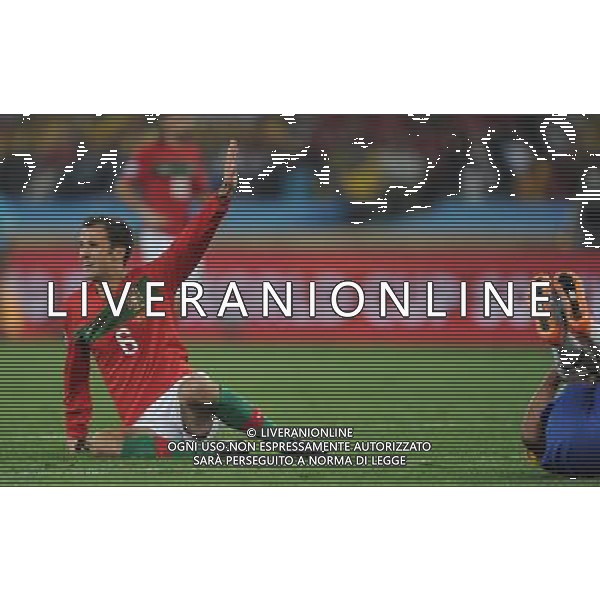 (100626) -- DURBAN, June 26, 2010 -- Ricardo Carvalho (L) of Portugal reacts during the Group G last round match against Brazil at 2010 FIFA World Cup, at Moses Mabhida stadium in Durban, South Africa, on June 25, 2010. The match tied 0-0. Both Brazil and Portugal are qualified for the round of 16. Chen Haitong) (dl) MONDIALI DI CALCIO SUDAFRICA 2010 PORTOGALLO BRASILE CALCIO SPORT ©PHOTOSHOT/ALDO LIVERANI ITALY ONLY