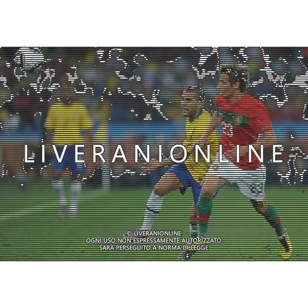 (100626) -- DURBAN, June 26, 2010 -- Brazil\'s Dani Alves (L) vies with Fabio Coentrao of Portugal during the Group G last round match at 2010 FIFA World Cup, at Moses Mabhida stadium in Durban, South Africa, on June 25, 2010. The match tied 0-0. Both Brazil and Portugal are qualified for the round of 16. Chen Haitong) (dl) MONDIALI DI CALCIO SUDAFRICA 2010 PORTOGALLO BRASILE CALCIO SPORT ©PHOTOSHOT/ALDO LIVERANI ITALY ONLY