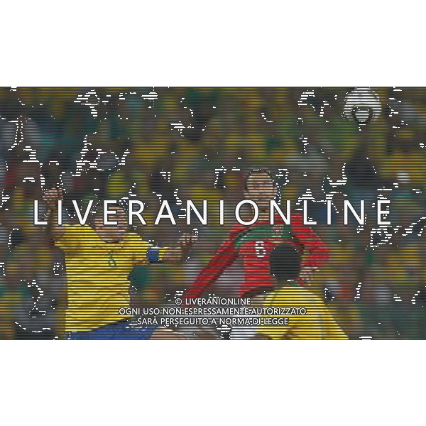 (100626) -- DURBAN, June 26, 2010 -- Brazil\'s Lucio (top L) vies with Ricardo Carvalho of Portugal during the Group G last round match at 2010 FIFA World Cup, at Moses Mabhida stadium in Durban, South Africa, on June 25, 2010. The match tied 0-0. Both Brazil and Portugal are qualified for the round of 16. Liao Yujie) (dl) MONDIALI DI CALCIO SUDAFRICA 2010 PORTOGALLO BRASILE CALCIO SPORT ©PHOTOSHOT/ALDO LIVERANI ITALY ONLY