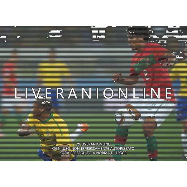 (100626) -- DURBAN, June 26, 2010 -- Brazil\'s Julio Baptista (L) falls on the pitch during the Group G last round match against Portugal at 2010 FIFA World Cup, at Moses Mabhida stadium in Durban, South Africa, on June 25, 2010. The match tied 0-0. Both Brazil and Portugal are qualified for the round of 16. Chen Haitong) (dl) MONDIALI DI CALCIO SUDAFRICA 2010 PORTOGALLO BRASILE CALCIO SPORT ©PHOTOSHOT/ALDO LIVERANI ITALY ONLY