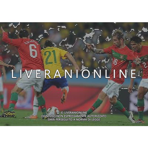 (100626) -- DURBAN, June 26, 2010 -- Brazil\'s Nilmar (2nd L) vies with Ricardo Carvalho (1st L) of Portugal during the Group G last round match at 2010 FIFA World Cup, at Moses Mabhida stadium in Durban, South Africa, on June 25, 2010. The match tied 0-0. Both Brazil and Portugal are qualified for the round of 16. Chen Haitong) (dl) MONDIALI DI CALCIO SUDAFRICA 2010 PORTOGALLO BRASILE CALCIO SPORT ©PHOTOSHOT/ALDO LIVERANI ITALY ONLY