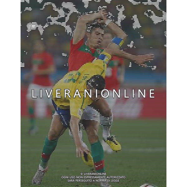 (100625) -- DURBAN, June 25, 2010 -- Brazil\'s captain Lucio (front) vies with Cristiano Ronaldo, captain of Portugal, during the Group G last round match at 2010 FIFA World Cup, at Moses Mabhida stadium in Durban, South Africa, on June 25, 2010. Liao Yujie) (dl) MONDIALI DI CALCIO SUDAFRICA 2010 PORTOGALLO BRASILE CALCIO SPORT ©PHOTOSHOT/ALDO LIVERANI ITALY ONLY