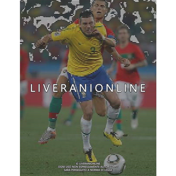 (100625) -- DURBAN, June 25, 2010 -- Brazil\'s captain Lucio (front) vies with Cristiano Ronaldo, captain of Portugal, during the Group G last round match at 2010 FIFA World Cup, at Moses Mabhida stadium in Durban, South Africa, on June 25, 2010.The match tied 0-0. Both Brazil and Portugal are qualified for the round of 16. Liao Yujie) (dl) MONDIALI DI CALCIO SUDAFRICA 2010 PORTOGALLO BRASILE CALCIO SPORT ©PHOTOSHOT/ALDO LIVERANI ITALY ONLY