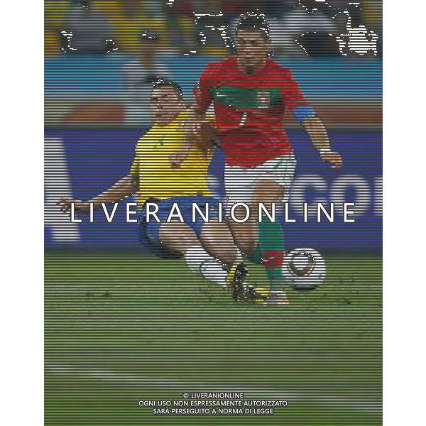 (100625) -- DURBAN, June 25, 2010 -- Brazil\'s captain Lucio (L) defends Cristiano Ronaldo, captain of Portugal, during the Group G last round match at 2010 FIFA World Cup, at Moses Mabhida stadium in Durban, South Africa, on June 25, 2010. Liao Yujie) (dl) MONDIALI DI CALCIO SUDAFRICA 2010 PORTOGALLO BRASILE CALCIO SPORT ©PHOTOSHOT/ALDO LIVERANI ITALY ONLY