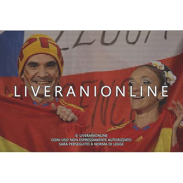 (100626) -- TSHWANE, June 26, 2010 -- Two fans of Spain cheer prior to the Group H last round match between Chile and Spain at 2010 FIFA World Cup, at Loftus Verfeld stadium in Tshwane, South Africa, on June 25, 2010. Xing Guangli) (fym) CILE SPAGNA MONDIALI SUDAFRICA 2010 ©PHOTOSHOT/ALDO LIVERANI ONLY ITALY