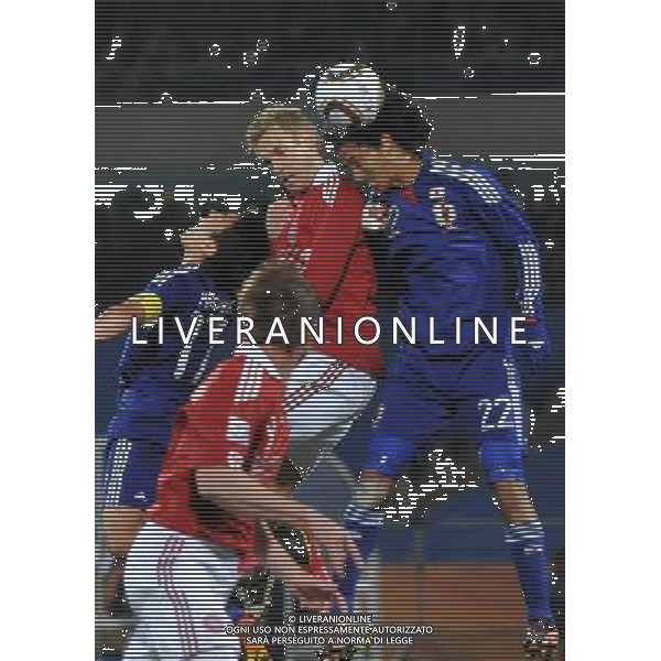 (100625) -- RUSTENBURG, June 25, 2010 () -- Yuji Nakazawa (1st R) heads the ball during the Group E last round match against Denmark at 2010 FIFA World Cup, at Royal Bafokeng stadium in Rustenburg, South Africa, on June 24, 2010. Japan won 3-1 and qualifies for the next round. (/Xu Suhui) (dl) CALCIO SPORT DANIMARCA GIAPPONE MONDIALI DI CALCIO SUDAFRICA 2010 ©PHOTSHOT/ALDO LIVERANI ITALY ONLY