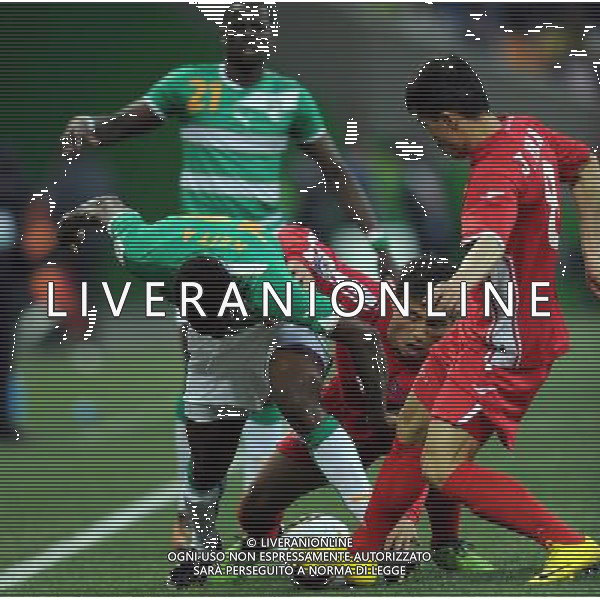 (100625) -- NELSPRUIT, June 25, 2010 -- Kader Keita (bottom L) of Cote d\'Ivoire vies with Ji Yun-Nam (R) of Democratic People\'s Republic of Korea during the Group G last round match at 2010 FIFA World Cup, at Mbombela Stadium in Nelspruit, South Africa, on June 25, 2010. Wang Yuguo)(fym) COSTA D\'AVORIO COREA DEL NORD FIFA WORLD CUP 2010 SUDAFRICA CALCIO SPORT ©PHOTOSHOT/ALDO LIVERANI ITALY ONLY