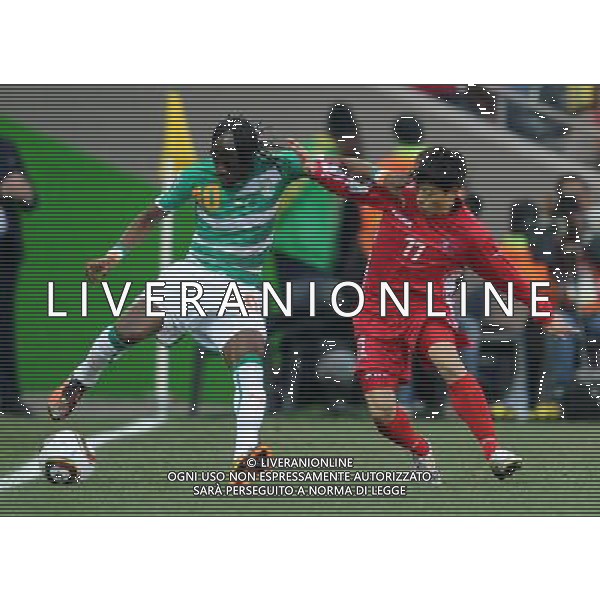 (100625) -- NELSPRUIT, June 25, 2010 -- Mun In-Guk (R) of the Democratic People\'s Republic of Korea (DPRK) vies with Gervinho of Cote d\'Ivoire during the Group G last round match at 2010 FIFA World Cup, at Mbombela Stadium in Nelspruit, South Africa, on June 25, 2010. Wang Yuguo)(fym) COSTA D\'AVORIO COREA DEL NORD FIFA WORLD CUP 2010 SUDAFRICA CALCIO SPORT ©PHOTOSHOT/ALDO LIVERANI ITALY ONLY