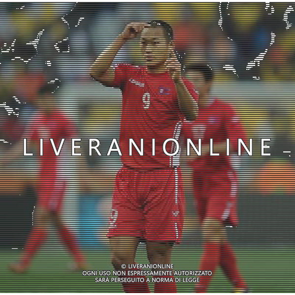 (100625) -- NELSPRUIT, June 25, 2010 -- Jong Tae-Se (C) of the Democratic People\'s Republic of Korea (DPRK) gestures during the Group G last round match against Cote d\'Ivoire at 2010 FIFA World Cup, at Mbombela Stadium in Nelspruit, South Africa, on June 25, 2010. Wang Yuguo)(fym) COSTA D\'AVORIO COREA DEL NORD FIFA WORLD CUP 2010 SUDAFRICA CALCIO SPORT ©PHOTOSHOT/ALDO LIVERANI ITALY ONLY