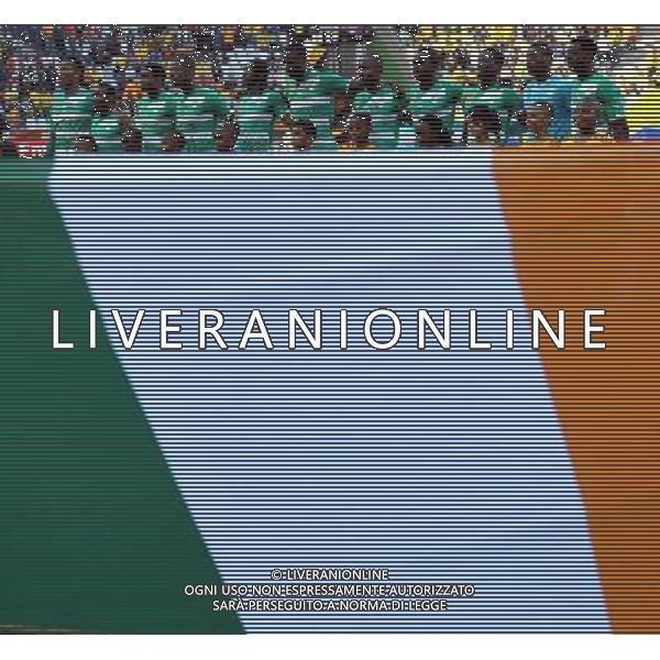 (100626) -- NELSPRUIT, June 26, 2010 -- Players of Cote d\'Ivoire listen to the national anthem before the Group G last round match against Democratic People\'s Republic of Korea (DPRK) at 2010 FIFA World Cup, at Mbombela Stadium in Nelspruit, South Africa, on June 25, 2010. Cote d\'Ivoire won 3-0 and both teams failed to progress to the next round. Wang Yuguo)(fym) COSTA D\'AVORIO COREA DEL NORD FIFA WORLD CUP 2010 SUDAFRICA CALCIO SPORT ©PHOTOSHOT/ALDO LIVERANI ITALY ONLY