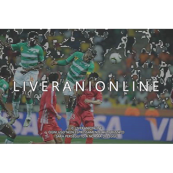 (100625) -- NELSPRUIT, June 25, 2010 -- Didier Drogba (Top R) of Cote d\'Ivoire heads the ball during the Group G last round match against Democratic People\'s Republic of Korea (DPRK) at 2010 FIFA World Cup, at Mbombela Stadium in Nelspruit, South Africa, on June 25, 2010. Cote d\'Ivoire won 3-0 and both teams failed to progress to the next round. Wang Yuguo)(fym) COSTA D\'AVORIO COREA DEL NORD FIFA WORLD CUP 2010 SUDAFRICA CALCIO SPORT ©PHOTOSHOT/ALDO LIVERANI ITALY ONLY