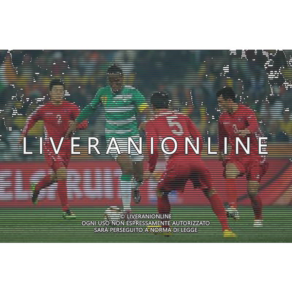 (100625) -- NELSPRUIT, June 25, 2010 -- Didier Drogba (2nd L) of Cote d\'Ivoire breaks through during the Group G last round match against Democratic People\'s Republic of Korea (DPRK) at 2010 FIFA World Cup, at Mbombela Stadium in Nelspruit, South Africa, on June 25, 2010. Cote d\'Ivoire won 3-0 and both teams failed to progress to the next round. Wang Yuguo)(fym) COSTA D\'AVORIO COREA DEL NORD FIFA WORLD CUP 2010 SUDAFRICA CALCIO SPORT ©PHOTOSHOT/ALDO LIVERANI ITALY ONLY