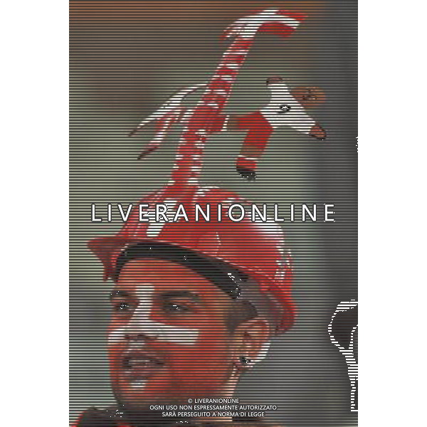 (100626) -- BLOEMFONTEIN, June 26, 2010 -- A fan of Switzerland cheers prior to the Group H last round match between Switzerland and Honduras at 2010 FIFA World Cup, at Free State stadium in Bloemfontein, South Africa, on June 25, 2010. Xu Suhui) (dl) FIFA WORLD CUP 2010 SVIZZERA HONDURAS CALCIO SPORT MONDIALI DI CALCIO 2010 SUDAFRICA ©PHOTOSHOT/ALDO LIVERANI ITALY ONLY