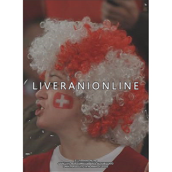 (100626) -- BLOEMFONTEIN, June 26, 2010 -- A fan of Switzerland cheers prior to the Group H last round match between Switzerland and Honduras at 2010 FIFA World Cup, at Free State stadium in Bloemfontein, South Africa, on June 25, 2010. Xu Suhui) (dl) FIFA WORLD CUP 2010 SVIZZERA HONDURAS CALCIO SPORT MONDIALI DI CALCIO 2010 SUDAFRICA ©PHOTOSHOT/ALDO LIVERANI ITALY ONLY