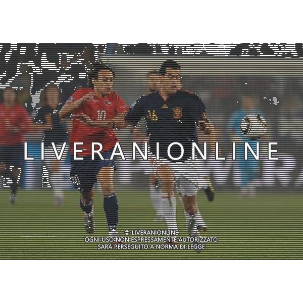 Fifa World Cup Sud Africa 2010 Match #47 Tshwane/Pretoria (Lotus Versfeld Stadium) - 25.06.2010 Cile-Spagna Nella Foto:Sergio BUSQUETS-Jorge VALDIVIA /Ph.Vitez-Ag. Aldo Liverani