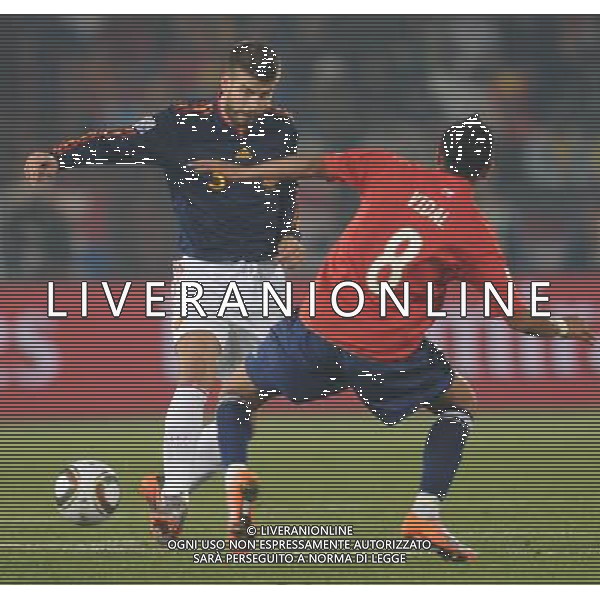 (100626) -- TSHWANE, June 26, 2010 -- CILE-SPAGNA NELLA FOTOArturo Vidal of Chile vies with Gerard Pique of Spain during the Group H last round match at 2010 FIFA World Cup, at Loftus Verfeld stadium in Tshwane, South Africa, on June 25, 2010. Spain won 2-1 and both teams are qualified for the next round. Li Ga) (fym) PHOTOSHOT-AG ALDO LIVERANI ONLY ITALY