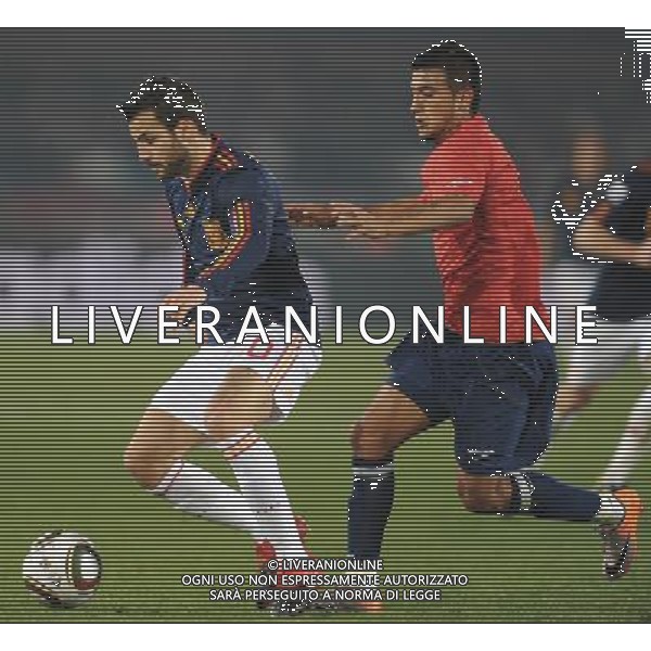 (100626) -- TSHWANE, June 26, 2010 -- Cesc Fabregas (L) of Spain vies with a player of Chile during the Group H last round match at 2010 FIFA World Cup, at Loftus Verfeld stadium in Tshwane, South Africa, on June 25, 2010. Spain won 2-1 and both teams are qualified for the next round. Li Ga) (fym) PHOTOSHOT-AG ALDO LIVERANI ONLY ITALY