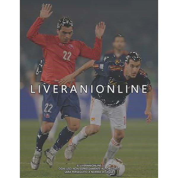 (100626) -- TSHWANE, June 26, 2010 -- Sergi Busquets (R) of Spain vies with Esteban Paredes of Chile during the Group H last round match at 2010 FIFA World Cup, at Loftus Verfeld stadium in Tshwane, South Africa, on June 25, 2010. Spain won 2-1 and both teams are qualified for the next round. Li Ga) (fym) PHOTOSHOT-AG ALDO LIVERANI ONLY ITALY