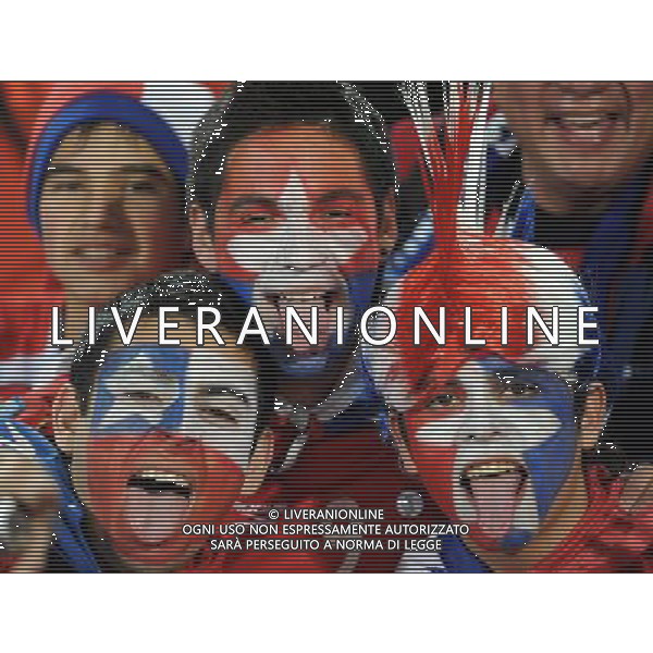 (100626) -- BLOEMFONTEIN, June 26, 2010 -- Fans of Chile cheer prior to the Group H last round match between Chile and Spain at 2010 FIFA World Cup, at Loftus Verfeld stadium in Tshwane, South Africa, on June 25, 2010. Li Ga) (fym) PHOTOSHOT-AG ALDO LIVERANI ONLY ITALY