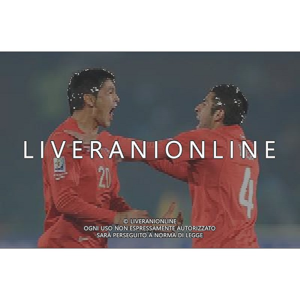 (100626) -- TSHWANE, June 26, 2010 -- Rodrigo Millar (L) of Chile celebrates his scoring with his teammate Mauricio Isla during the Group H last round match against Spain at 2010 FIFA World Cup, at Loftus Verfeld stadium in Tshwane, South Africa, on June 25, 2010. Guo Yong) (fym) PHOTOSHOT-AG ALDO LIVERANI ONLY ITALY