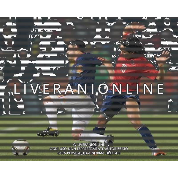 (100626) -- TSHWANE, June 26, 2010 -- Jorge Valdivia (R) of Chile vies with a player of Spain during the Group H last round match at 2010 FIFA World Cup, at Loftus Verfeld stadium in Tshwane, South Africa, on June 25, 2010. Li Ga) (fym) PHOTOSHOT-AG ALDO LIVERANI ONLY ITALY