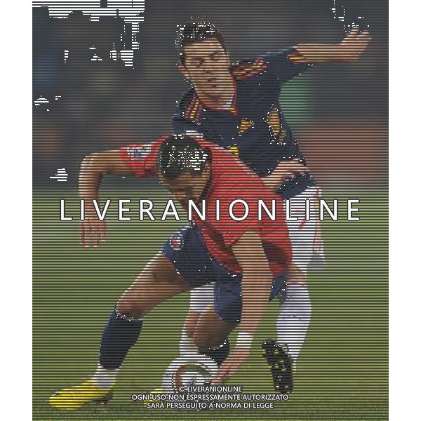(100626) -- TSHWANE, June 26, 2010 -- David Villa (top) of Spain vies with a player of Chile during the Group H last round match at 2010 FIFA World Cup, at Loftus Verfeld stadium in Tshwane, South Africa, on June 25, 2010. Li Ga) (fym) PHOTOSHOT-AG ALDO LIVERANI ONLY ITALY