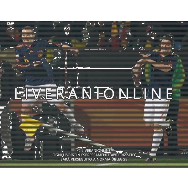 (100626) -- TSHWANE, June 26, 2010 -- Andres Iniesta (L) of Spain celebrates his scoring during the Group H last round match against Chile at 2010 FIFA World Cup, at Loftus Verfeld stadium in Tshwane, South Africa, on June 25, 2010. Li Ga) (fym) PHOTOSHOT-AG ALDO LIVERANI ONLY ITALY