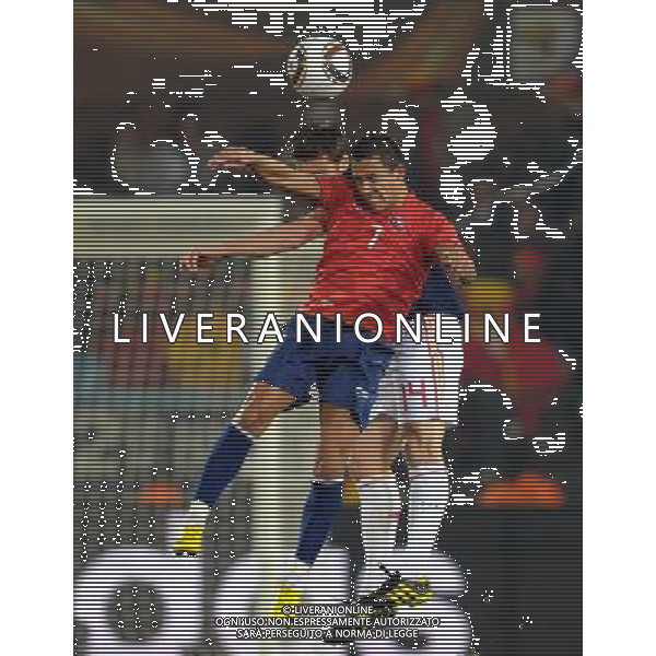 (100626) -- TSHWANE, June 26, 2010 -- Alexis Sanchez (front) of Chile vies with Xabi Alonso of Spain during the Group H last round match at 2010 FIFA World Cup, at Loftus Verfeld stadium in Tshwane, South Africa, on June 25, 2010. Guo Yong) (fym) PHOTOSHOT-AG ALDO LIVERANI ONLY ITALY