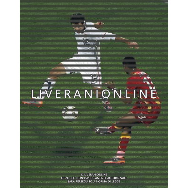 (100627) -- RUSTENBERG, June 27, 2010 -- Andre Ayew (bottom) of Ghana vies with Jonathan Bornstein of the United States during their 2010 World Cup round of 16 soccer match at Royal Bafokeng Stadium in Rustenburg, South Africa, on June 26, 2010. Xing Guangli) (fym)