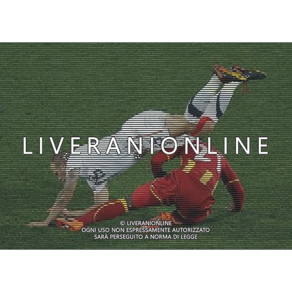 (100627) -- RUSTENBERG, June 27, 2010 -- Jay Demerit (top) of the United States vies with Kwadwo Asamoah of Ghana during their 2010 World Cup round of 16 soccer match at Royal Bafokeng Stadium in Rustenburg, South Africa, on June 26, 2010. Xing Guangli) (fym)