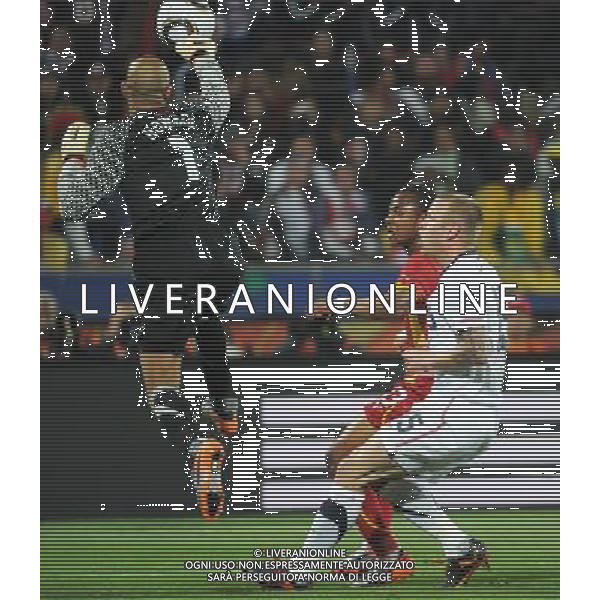 (100627) -- RUSTENBERG, June 27, 2010 -- Tim Howard (L), the goalkeeper of the United States, saves a ball during the 2010 World Cup round of 16 soccer match against Ghana at Royal Bafokeng Stadium in Rustenburg, South Africa, on June 26, 2010. Li Ga) (fym)