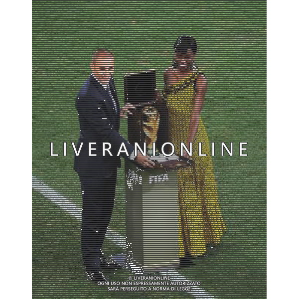 (100712) -- JOHANNESBURG, July 12, 2010 () -- Italian footballer Fabio Cannavaro (L), captain of the 2006 World Cup winning team, opens a box containing the World Cup trophy before the final between the Netherlands and Spain at Soccer City stadium in Johannesburg, South Africa, July 11, 2010. (/Li Ga) ©Photoshot/Agenzia Aldo Liverani Sas - ITALY ONLY: OLANDA - SPAGNA FINALE FIFA WORLD CUP CAMPIONATI MONDIALI SUD AFRICA 2010