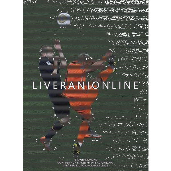 (100712) -- JOHANNESBURG, July 12, 2010 () -- Nigel De Jong (R) of the Netherlands and Andres Iniesta of Spain vie for the ball during the World Cup final at Soccer City stadium in Johannesburg, South Africa, July 11, 2010. (/Chen Haitong) ©Photoshot/Agenzia Aldo Liverani Sas - ITALY ONLY: OLANDA - SPAGNA FINALE FIFA WORLD CUP CAMPIONATI MONDIALI SUD AFRICA 2010