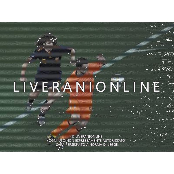 (100712) -- JOHANNESBURG, July 12, 2010 () -- Robin Van Persie (R) of the Netherlands and Carles Puyol of Spain vie for the ball during the World Cup final at Soccer City stadium in Johannesburg, South Africa, July 11, 2010. (/Chen Haitong)(lb) ©Photoshot/Agenzia Aldo Liverani Sas - ITALY ONLY: OLANDA - SPAGNA FINALE FIFA WORLD CUP CAMPIONATI MONDIALI SUD AFRICA 2010