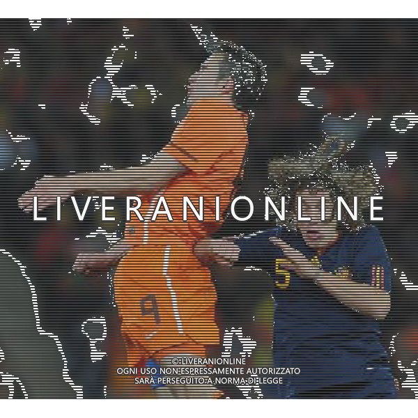 Fifa World Cup Sud Africa 2010 Match #64 Finale Johannesburg (Soccer City Stadium) - 11.07.2010 Olanda-Spagna Nella Foto:Robin VAN PERSIE-Carles PUYOL /Ph.Vitez-Ag. Aldo Liverani