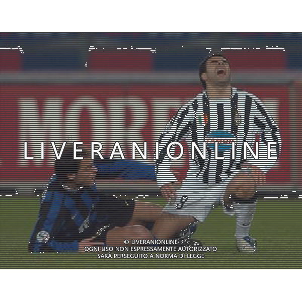 TORINO 04/02/04 SEMIFINALE TIM CUP 2003/04 JUVENTUS - INTER nella foto farinos francisco con miccoli fabrizio ph gigi arcaini/ag.aldo liverani