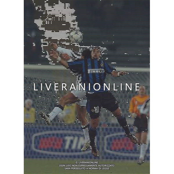TORINO 04/02/04 SEMIFINALE TIM CUP 2003/04 JUVENTUS - INTER nella foto iuliano mark con adriano leite ribeiro ph gigi arcaini/ag.aldo liverani