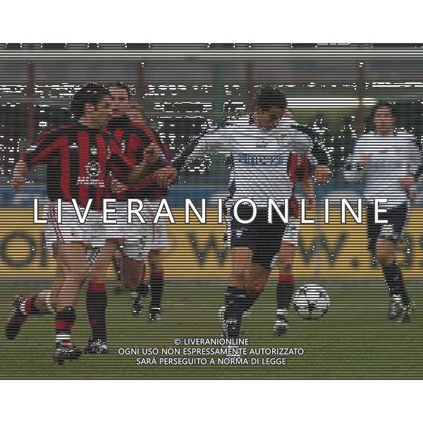 MILANO 05/02/04 SEMIFINALE DI COPPA TIM 2003/04 MILAN-LAZIO nella foto rui costa manuel con cesar rodriguez ph gigi arcaini/ag.aldo liverani