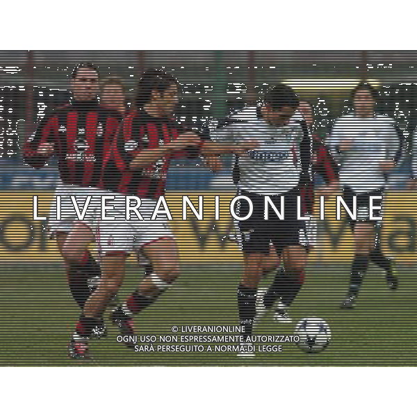 MILANO 05/02/04 SEMIFINALE DI COPPA TIM 2003/04 MILAN-LAZIO nella foto rui costa manuel con cesar rodriguez ph gigi arcaini/ag.aldo liverani