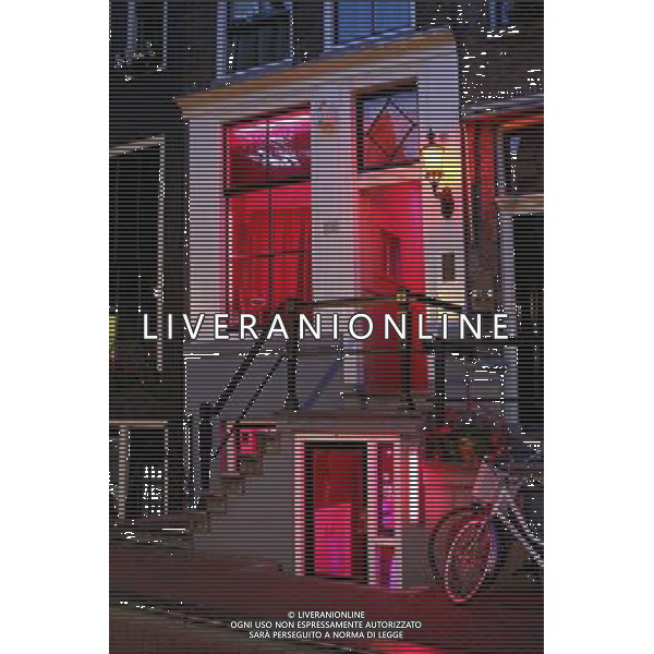 Red lights in window of house in the red light district of Amsterdam, Holland ©PHOTOSHOT/Agenzia Aldo Liverani Sas - ITALY ONLY - VEDUTE DELLA CITTA\' DI AMSTERDAM IN OLANDA PAESI BASSI