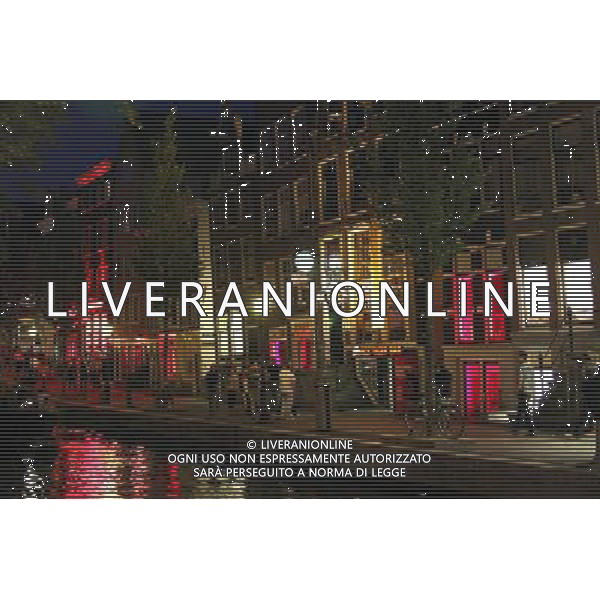 Red lights in window of houses in the red light district of Amsterdam, Holland ©PHOTOSHOT/Agenzia Aldo Liverani Sas - ITALY ONLY - VEDUTE DELLA CITTA\' DI AMSTERDAM IN OLANDA PAESI BASSI