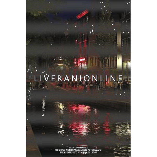 Red lights in window of houses on the canal in the red light district of Amsterdam, Holland ©PHOTOSHOT/Agenzia Aldo Liverani Sas - ITALY ONLY - VEDUTE DELLA CITTA\' DI AMSTERDAM IN OLANDA PAESI BASSI